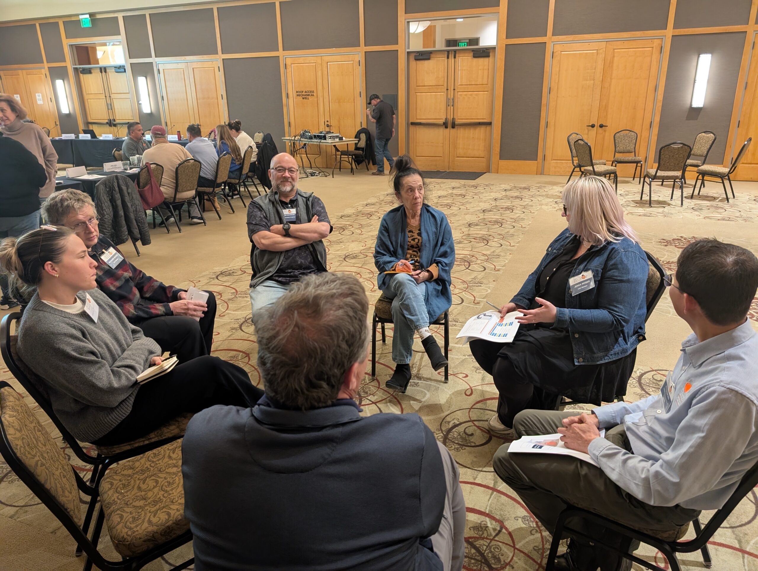 CAC members having a small group discussion during the first CAC meeting of 2025.