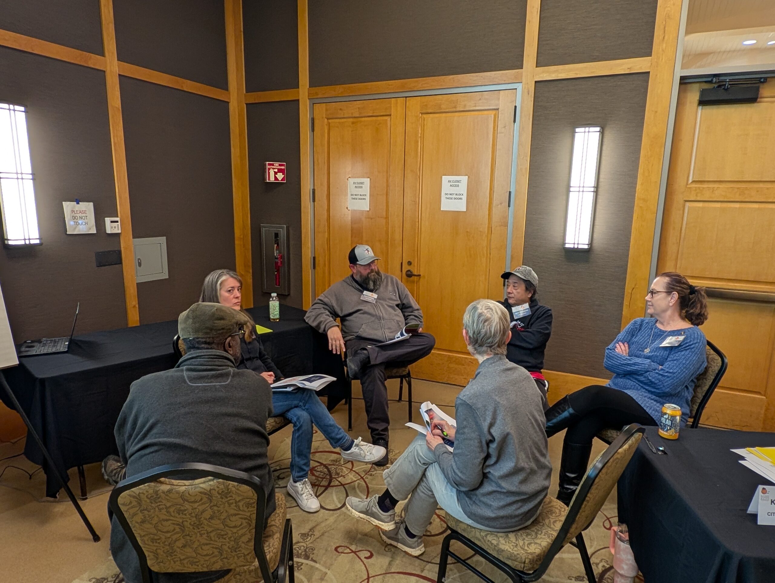 CAC members having a small group discussion during the first CAC meeting of 2025.